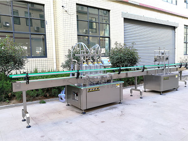 食用油自动灌装机和压盖机组成生产线